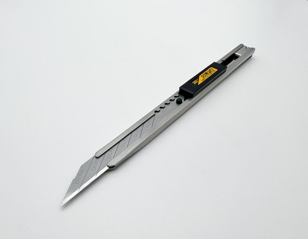 Нож Olfa (9 мм) -  ~ в е DALOKA.RU